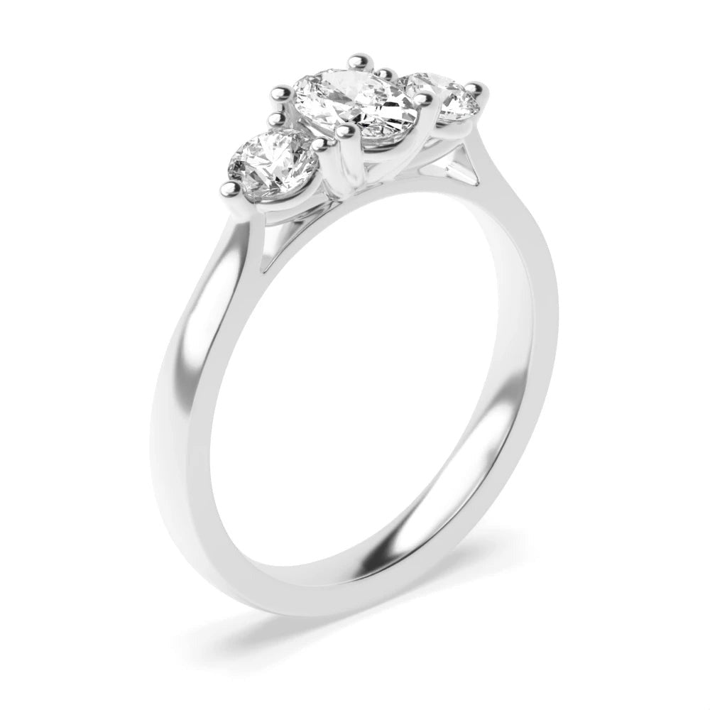 Aria High Set Oval Lab Grown Diamond And Round Raised Setting Three Stone Engagement Ring