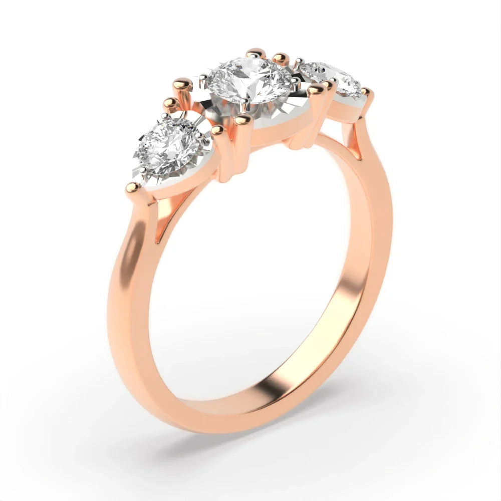 Dante 4 Prong Round 0.10ct Lab Grown Diamond And Pear Shape Illusion Three Stone Engagement Ring