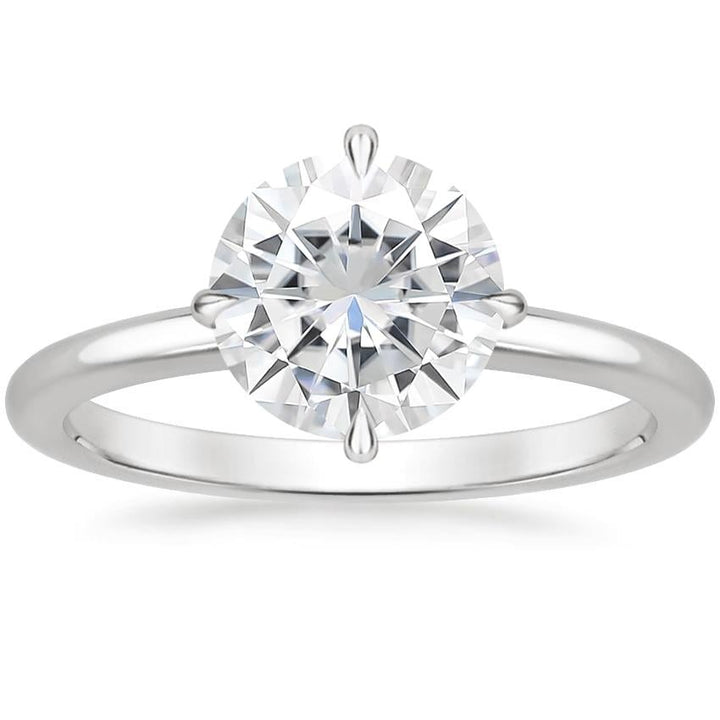 Frosty 4-Prong Round Solitaire Moissanite Engagement Ring White Gold