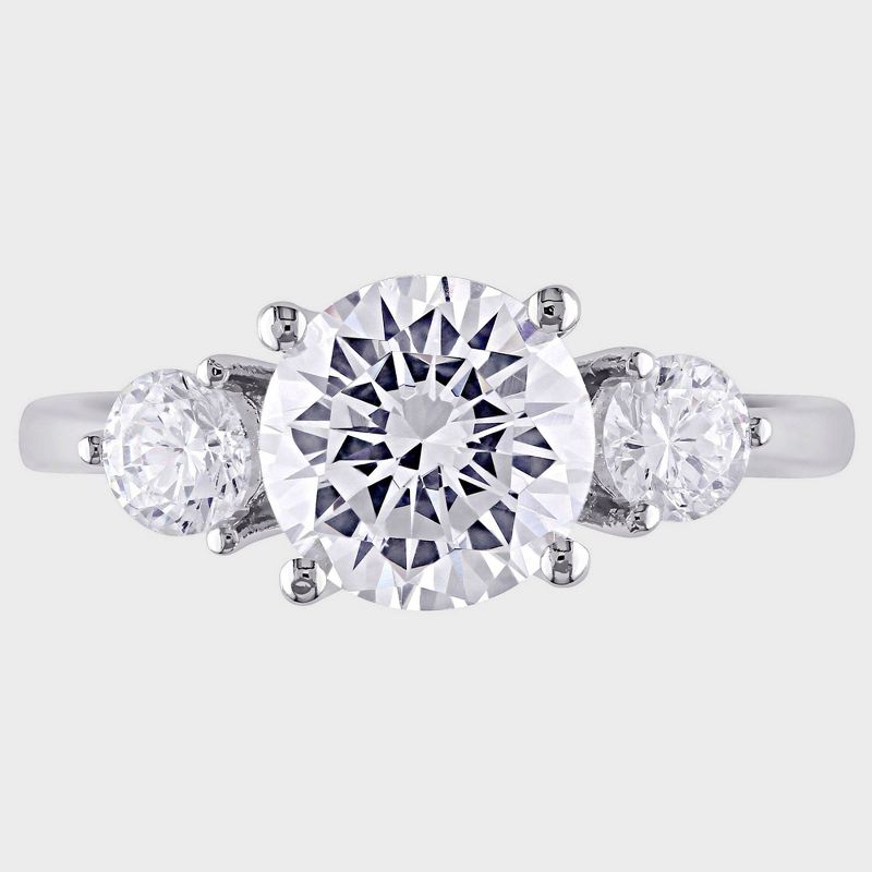 Glittering Round Three-Stone Moissanite Engagement Ring White Gold