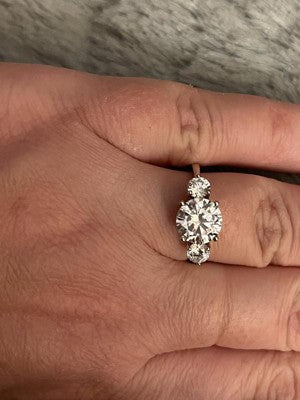 Glittering Round Three-Stone Moissanite Engagement Ring White Gold