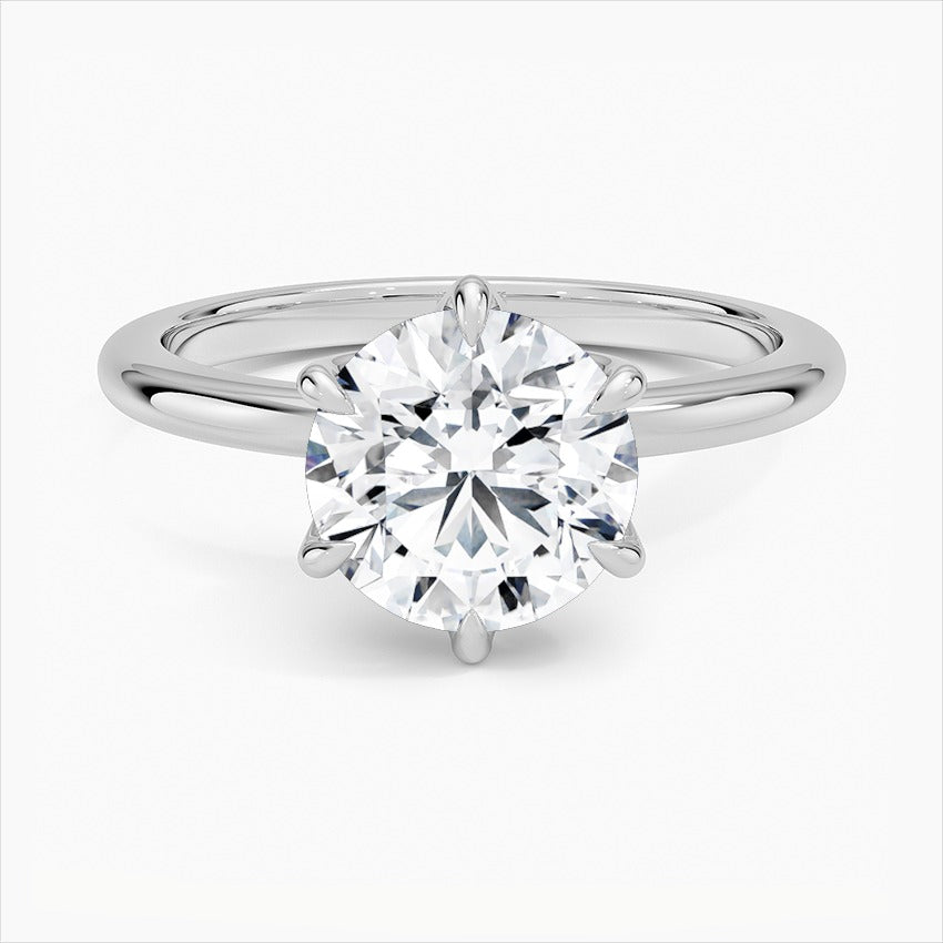 Luminary Round 6 Prong Solitaire Moissanite Engagement Ring Silver 925