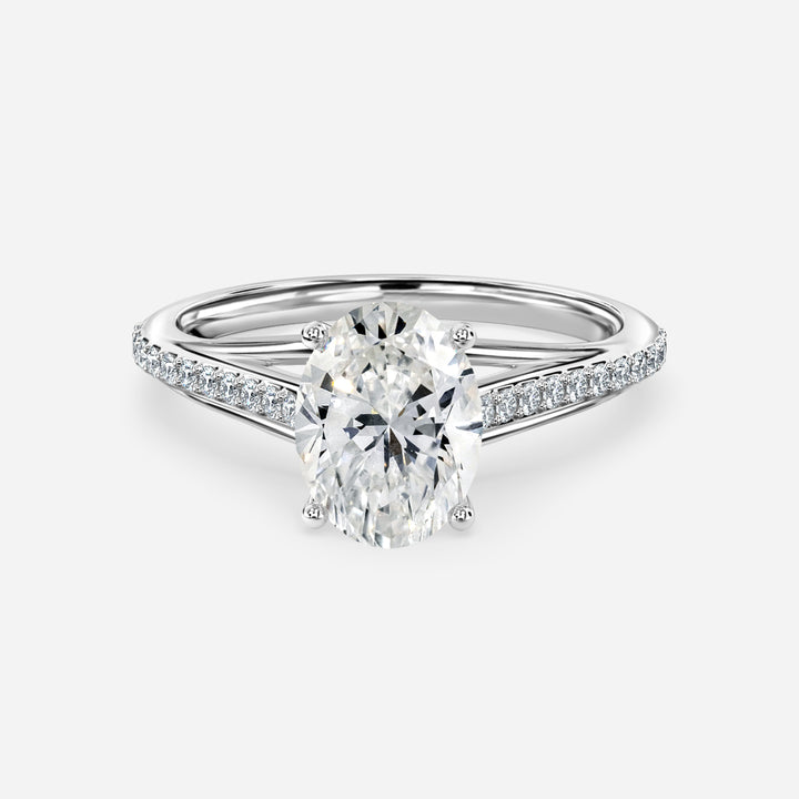 Magnificent Oval Side Stones Moissanite Engagement Ring White Gold