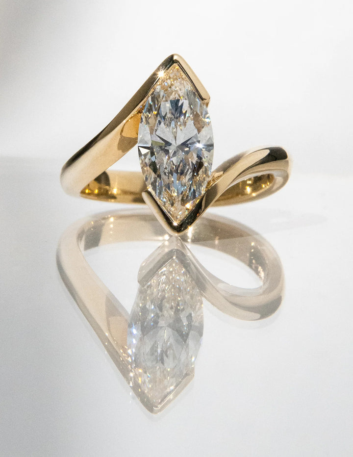 Marquise Cut Moissanite Vertical Ring — Half Bezel Setting