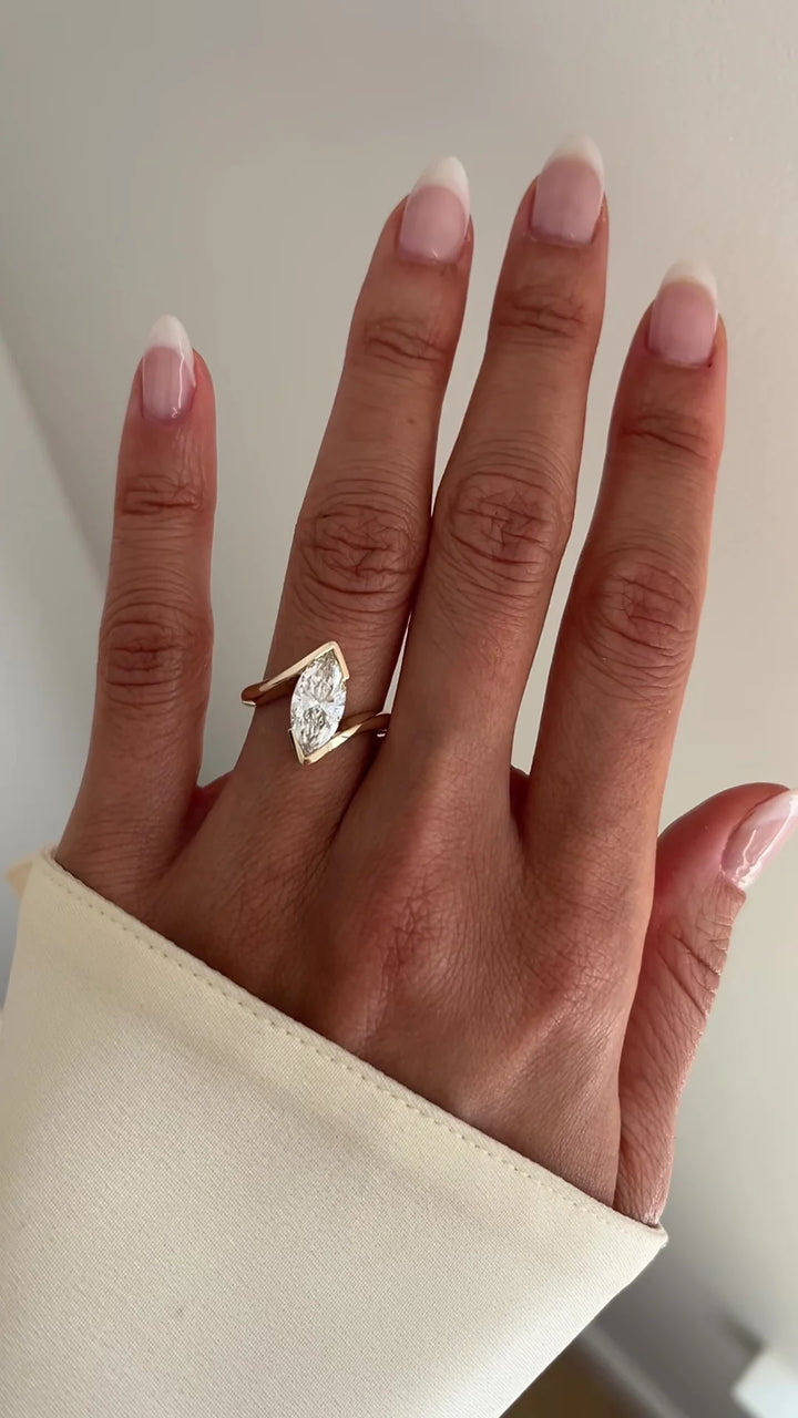 Marquise Cut Moissanite Vertical Ring — Half Bezel Setting
