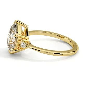 Nebula 6-Prong Pear Three Stone Moissanite Engagement Ring Yellow Gold