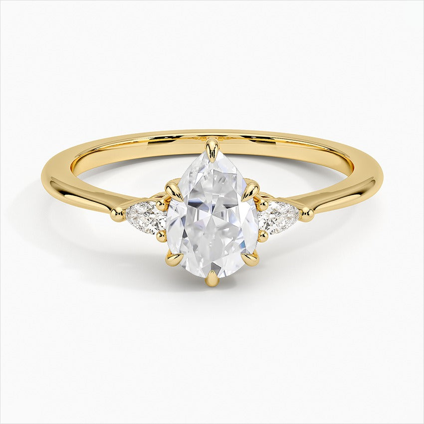 Nebula 6-Prong Pear Three Stone Moissanite Engagement Ring Yellow Gold
