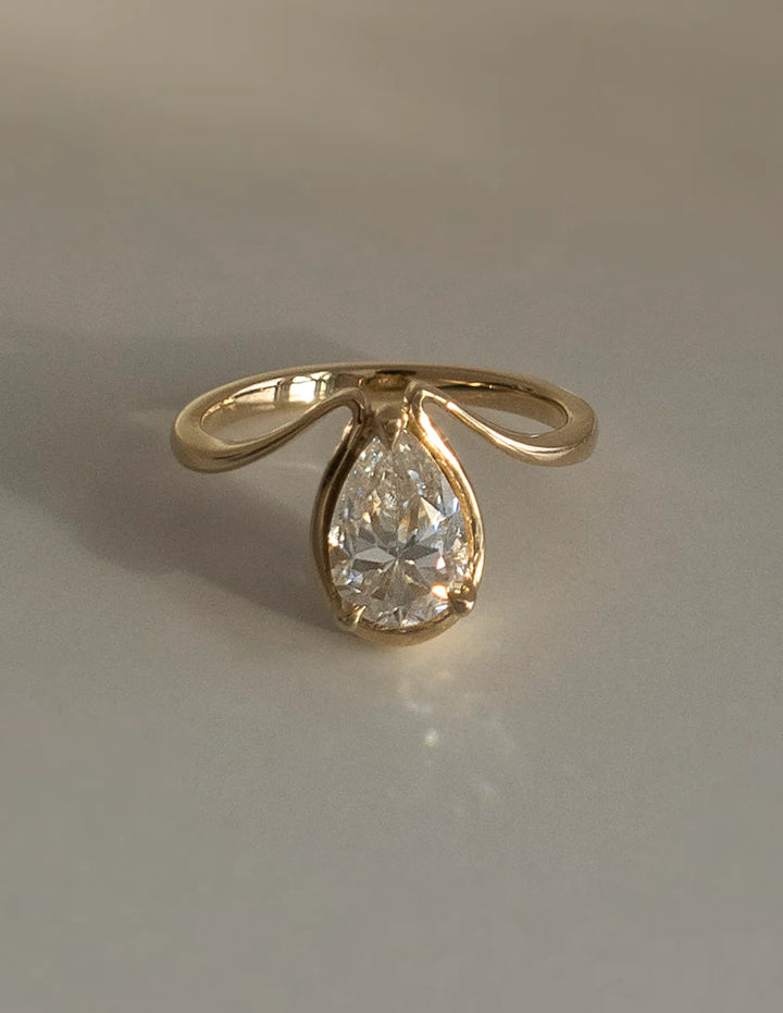 Dewdrop-Inspired 3 Carat Pear Cut Moissanite Ring in 18K Rose Gold