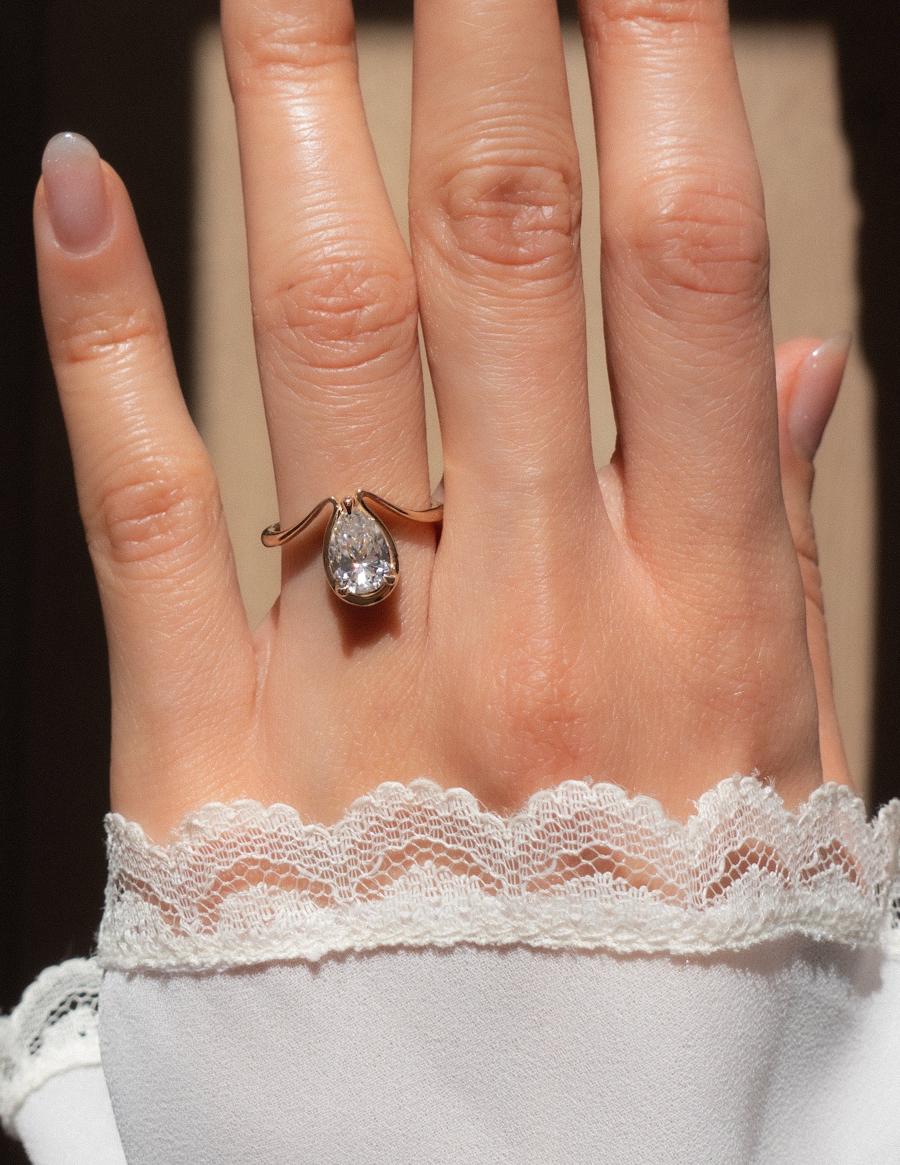 Pear Cut Moissanite Dewdrop-Inspired Engagement Ring