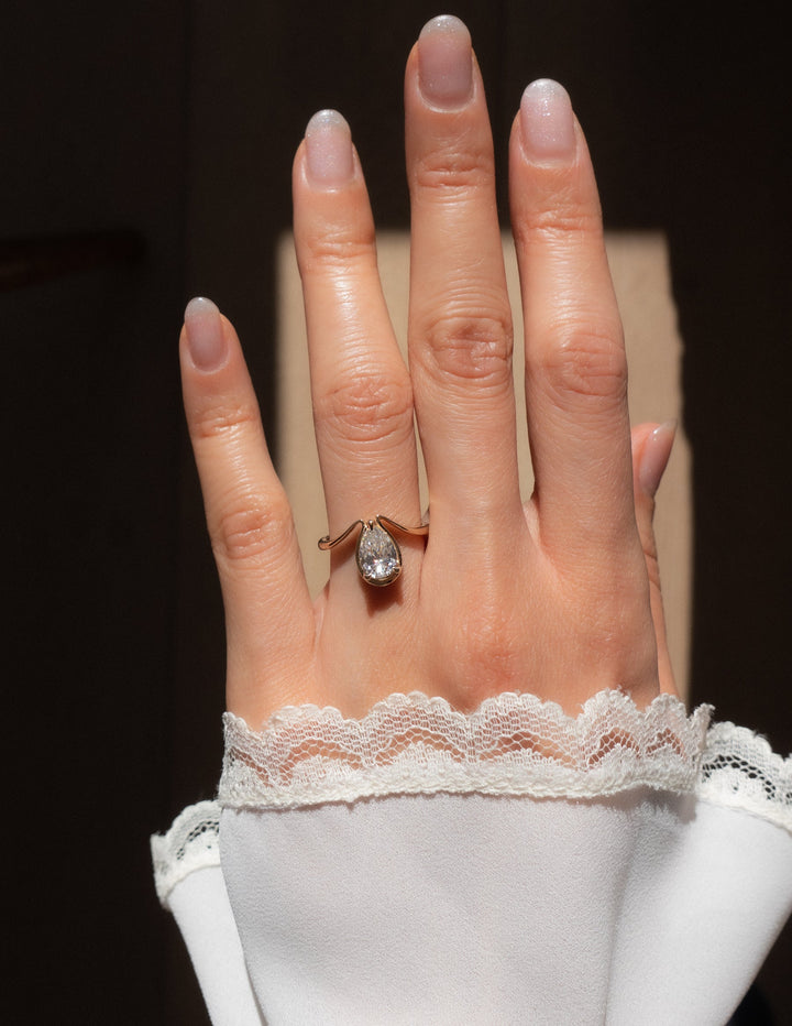 Pear Cut Moissanite Dewdrop-Inspired Engagement Ring