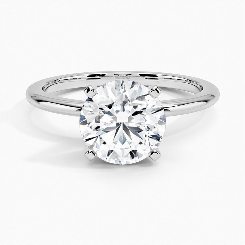 Sheen Round Four-Prong Solitaire Moissanite Engagement Ring White Gold