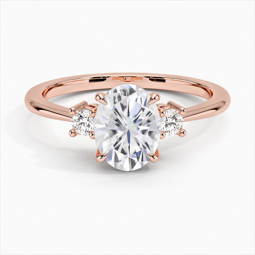 Solace Four-Prong Oval Three Stone Moissanite Engagement Ring Rose Gold