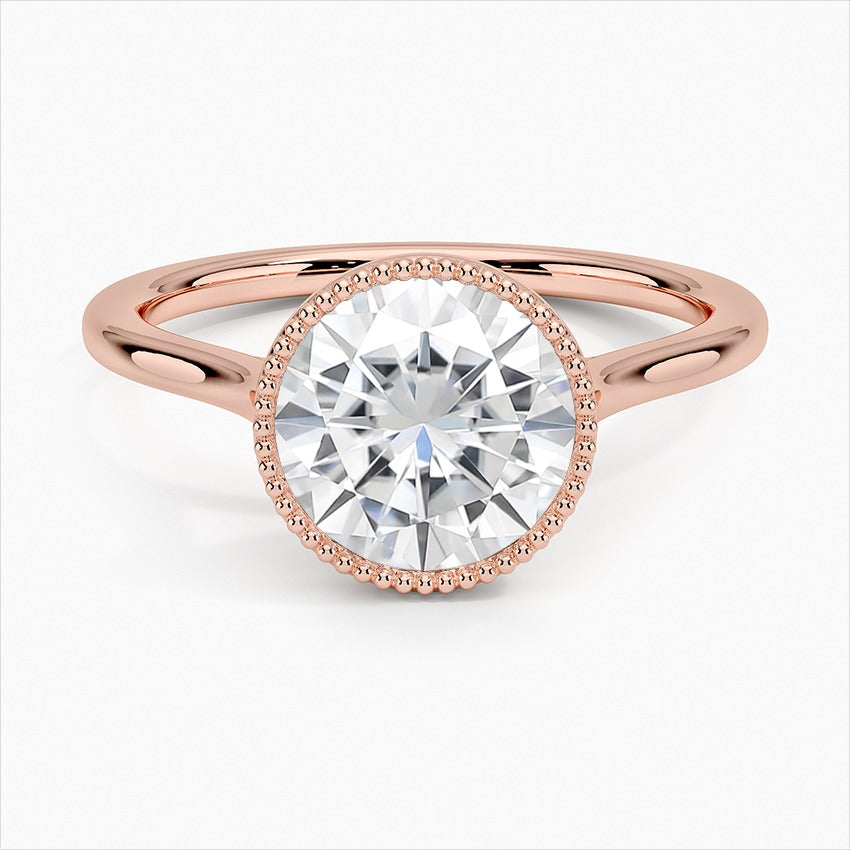 Spellbound Round Cut Bezel Statement Moissanite Engagement Ring Rose Gold