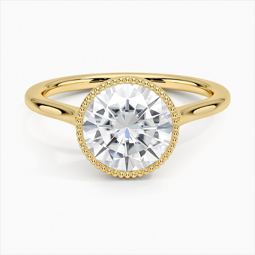 Spellbound Round Cut Bezel Statement Moissanite Engagement Ring Yellow Gold