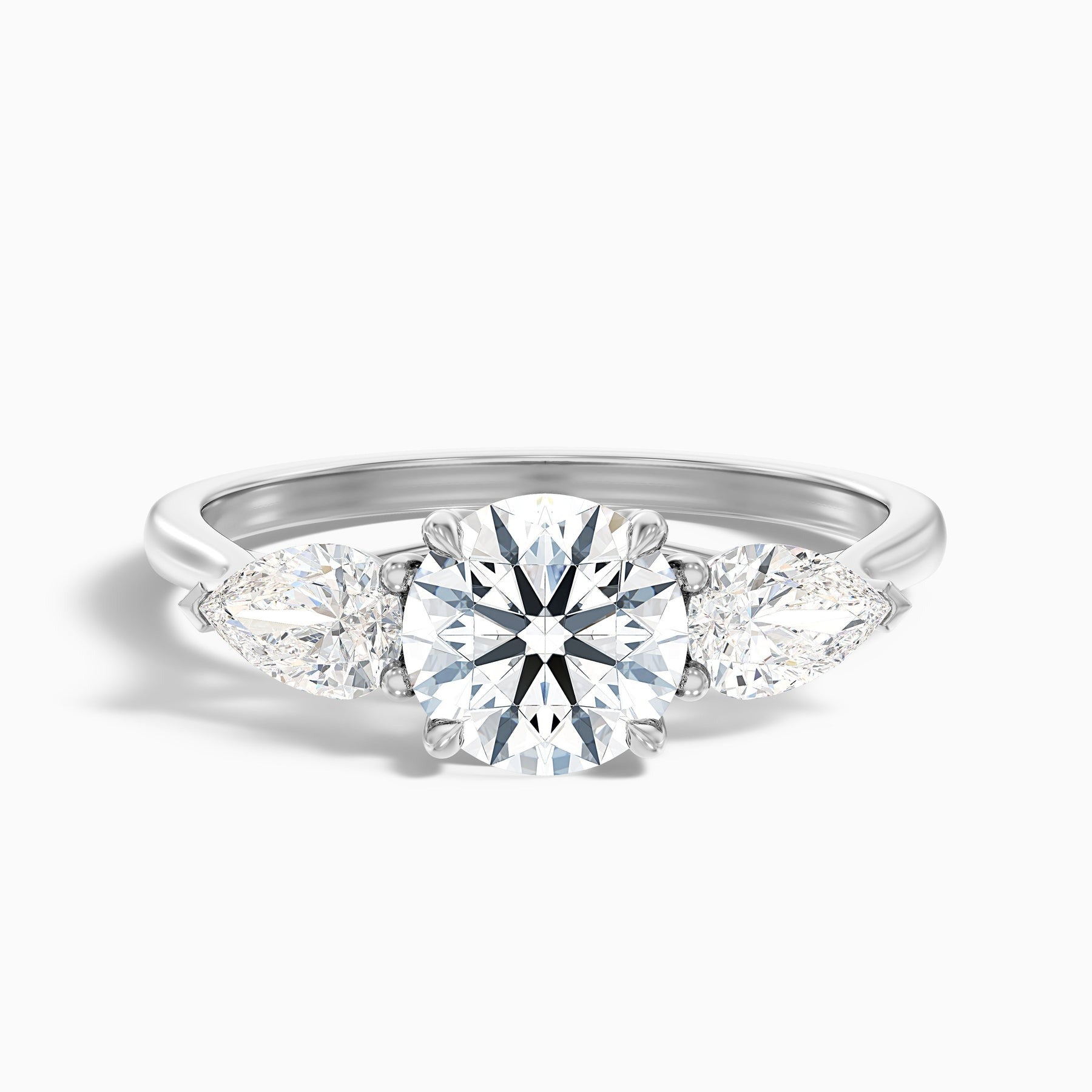 Starlit Round 3 Stone Moissanite Ring With Pear Side Stone