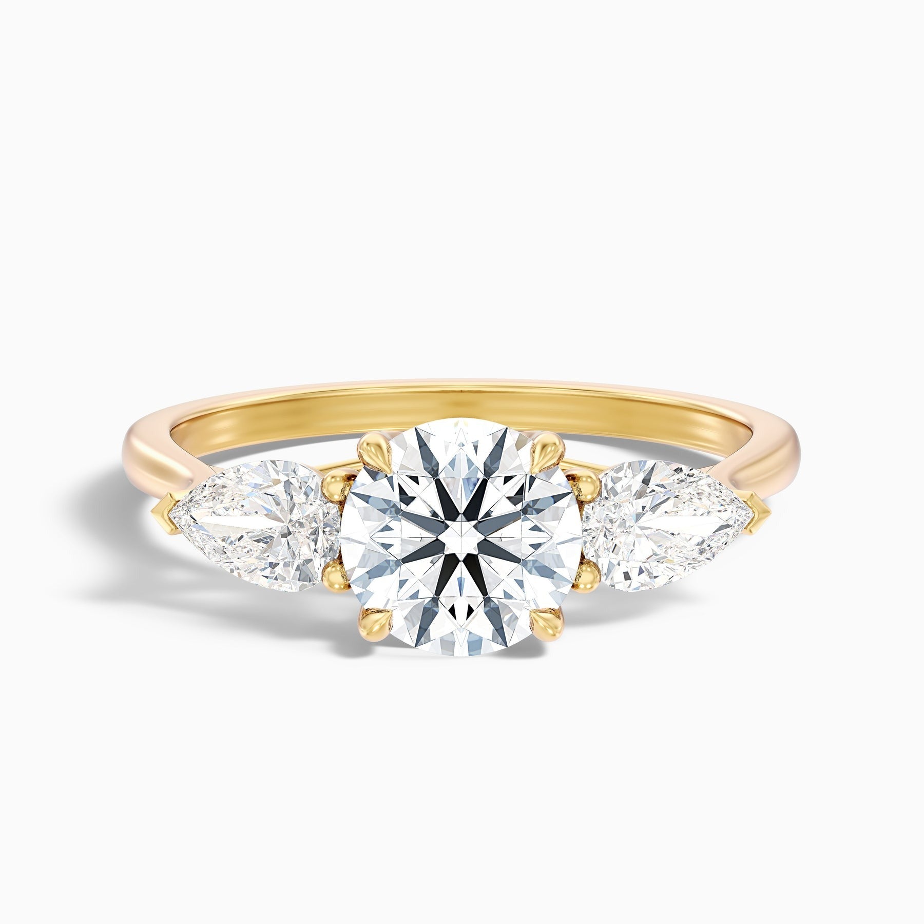 Starlit Round 3 Stone Moissanite Ring With Pear Side Stone