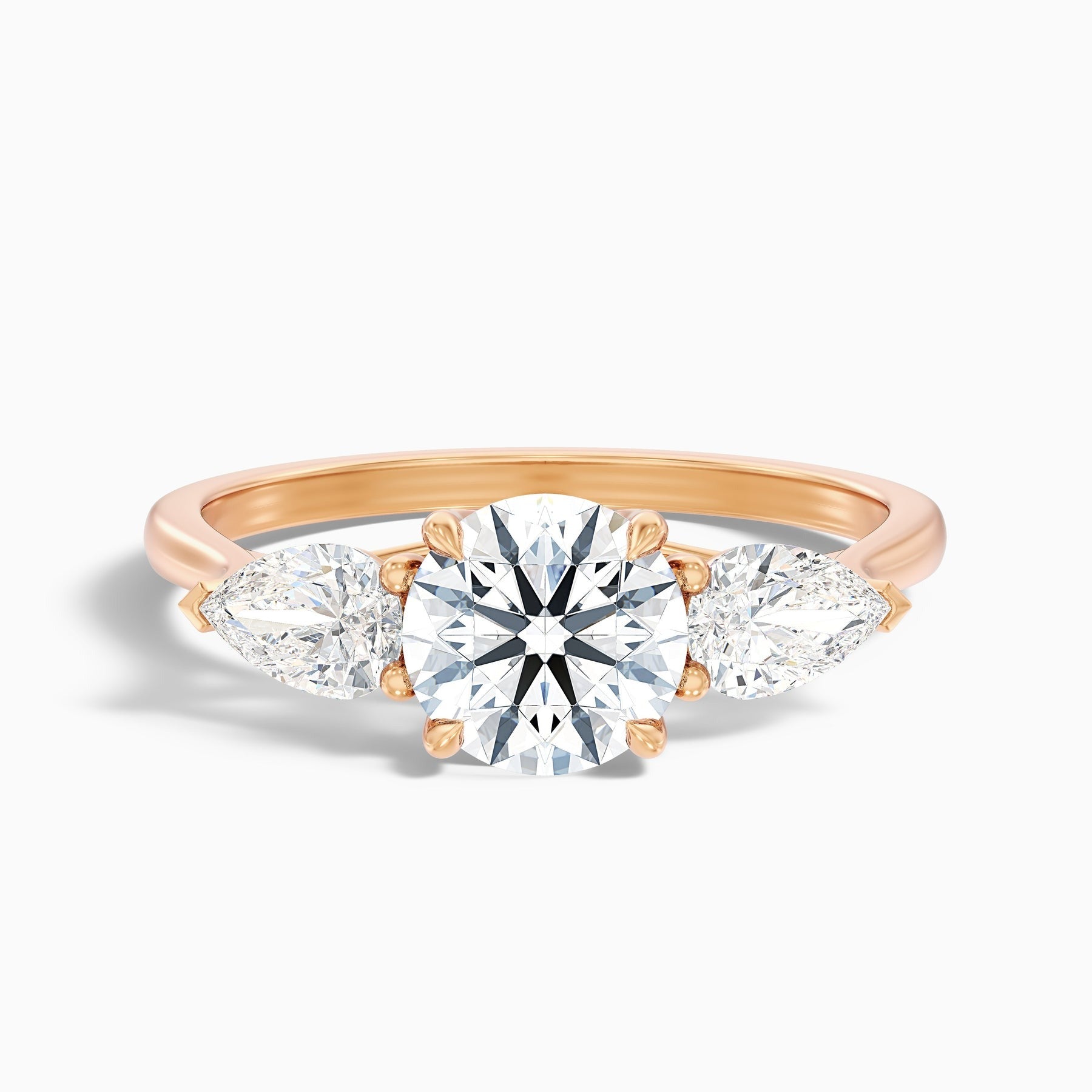 Starlit Round 3 Stone Moissanite Ring With Pear Side Stone