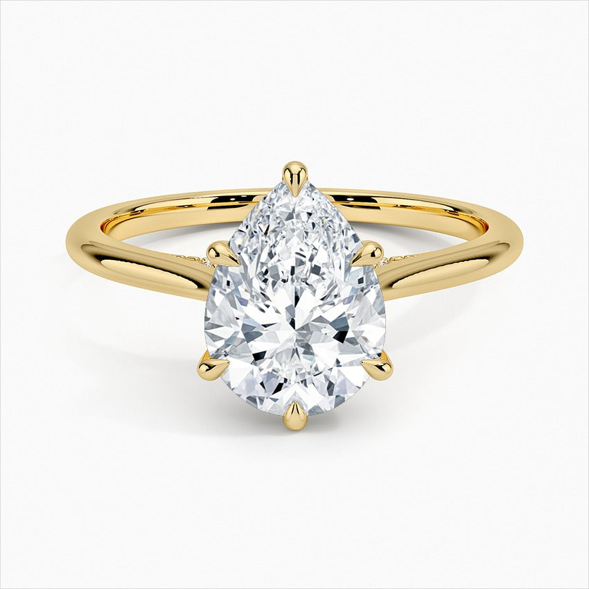 Stellar Pear Cut Solitaire Moissanite Engagement Ring Yellow Gold