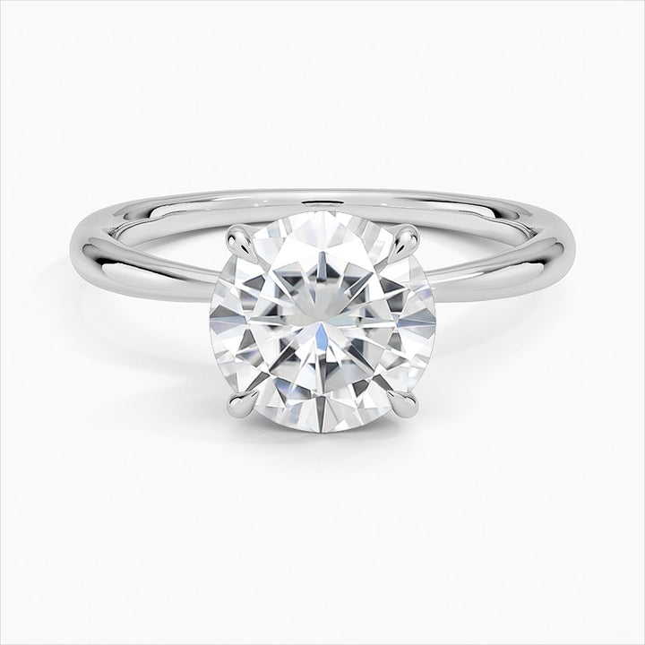 Tranquility Round Solitaire Moissanite Engagement Ring White Gold