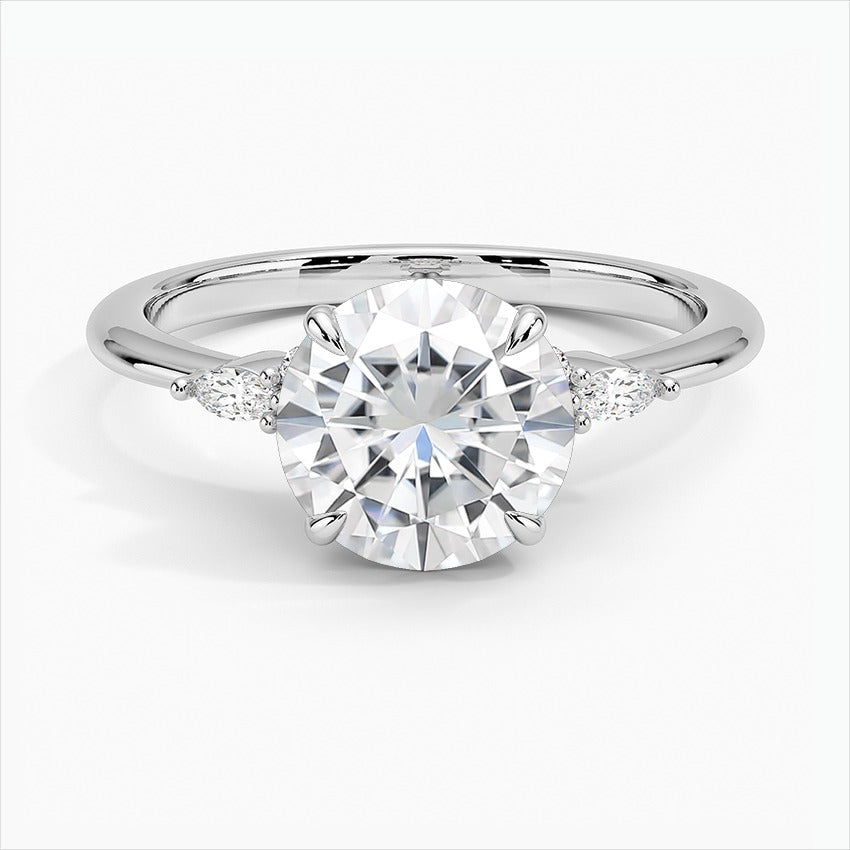 Windswept Four-Prong Round Moissanite Engagement Ring White Gold