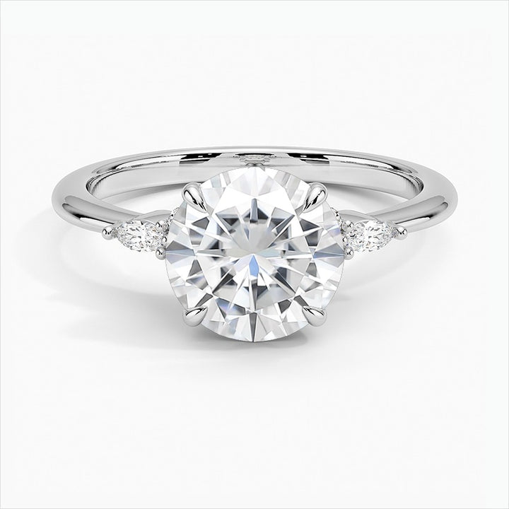 Windswept Four-Prong Round Moissanite Engagement Ring White Gold
