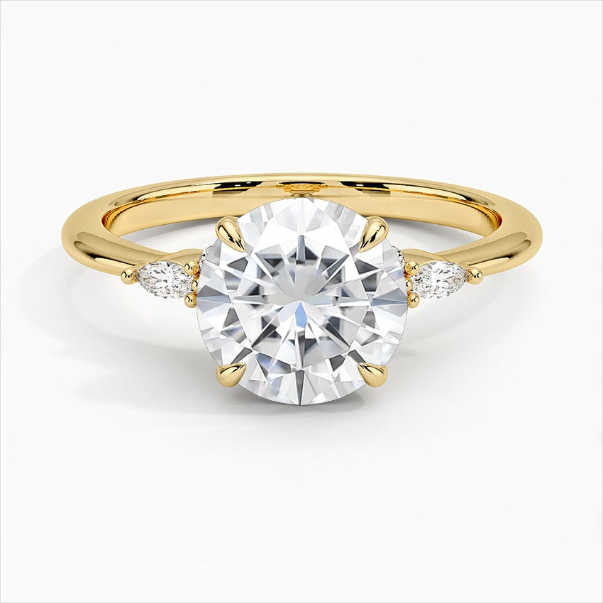 Windswept Four-Prong Round Moissanite Engagement Ring Yellow Gold