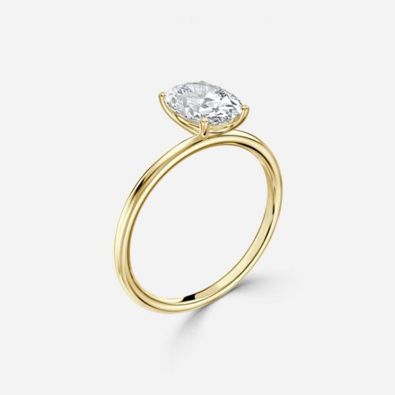 Bloom Oval Solitaire Moissanite Engagement RingBloom Oval Solitaire Moissanite Engagement Ring Yellow Gold